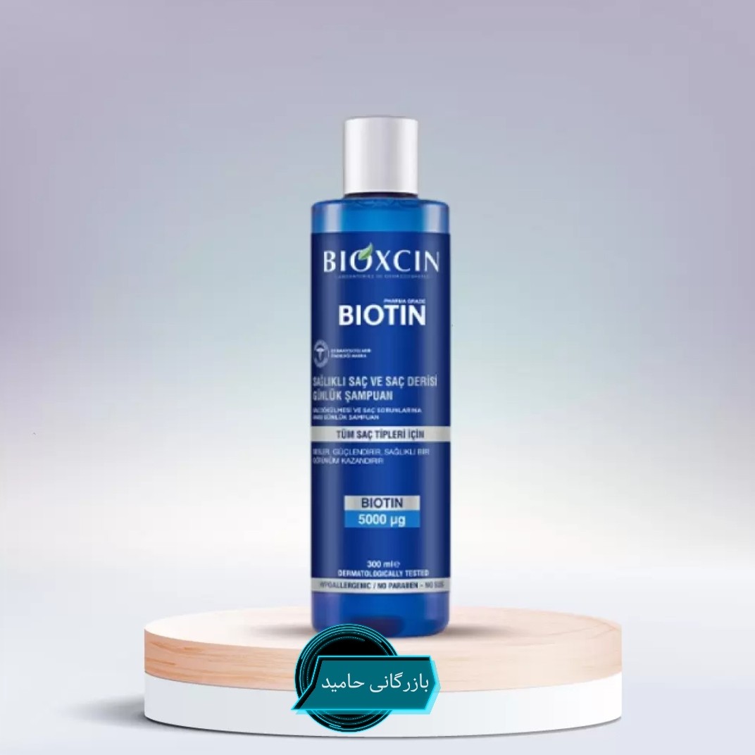 شامپو ضد ریزش مو بیوکسین مدل بیوتین حجم 300 میلی لیترBioxin hair shampoo biotin model  volume 300 ml